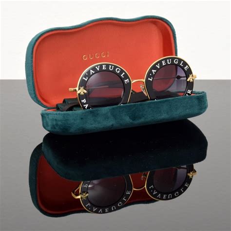 aveugle par l'amour gucci|Gucci l'aveugle par amour sunglasses.